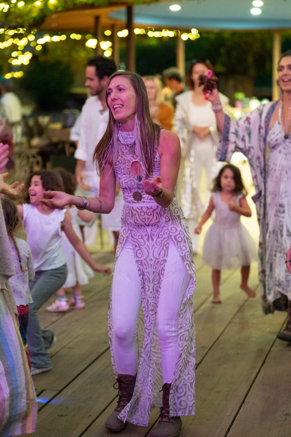 Children and families dancing together
